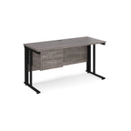 Office desk with grey wood-effect top, matching pedestal and black metal legs on a white background