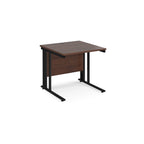 Office desk with wood-effect top and black metal legs on a white background