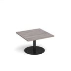 Square coffee table with a grey wood-effect top and black round base on a white background