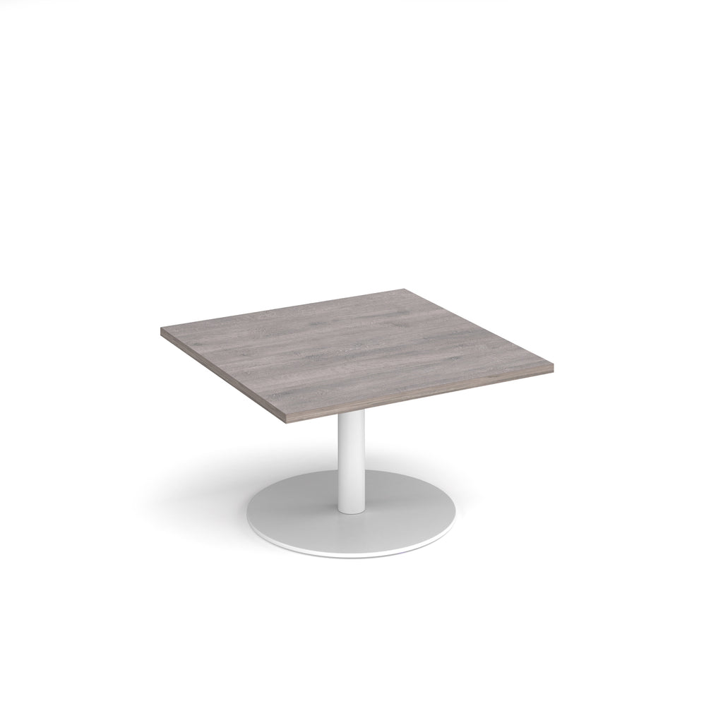Square coffee table with grey wood-effect top and white round base on a white background