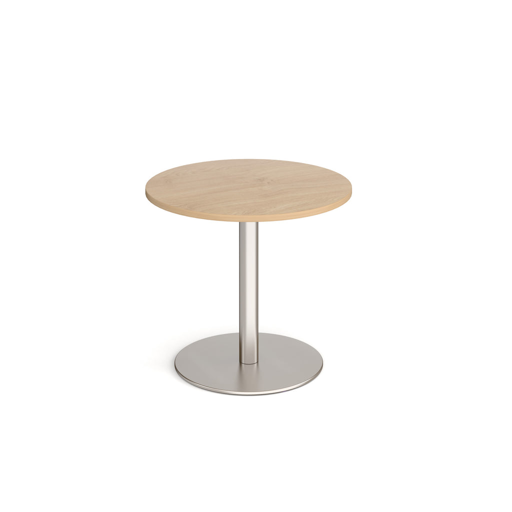 Round table with wood-effect top and metal base on a white background
