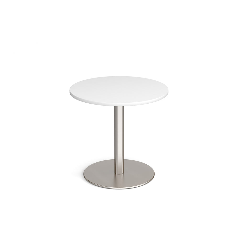 Round table with white top and metal base on a white background