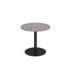 Round table with grey wood-effect top and black base on a white background