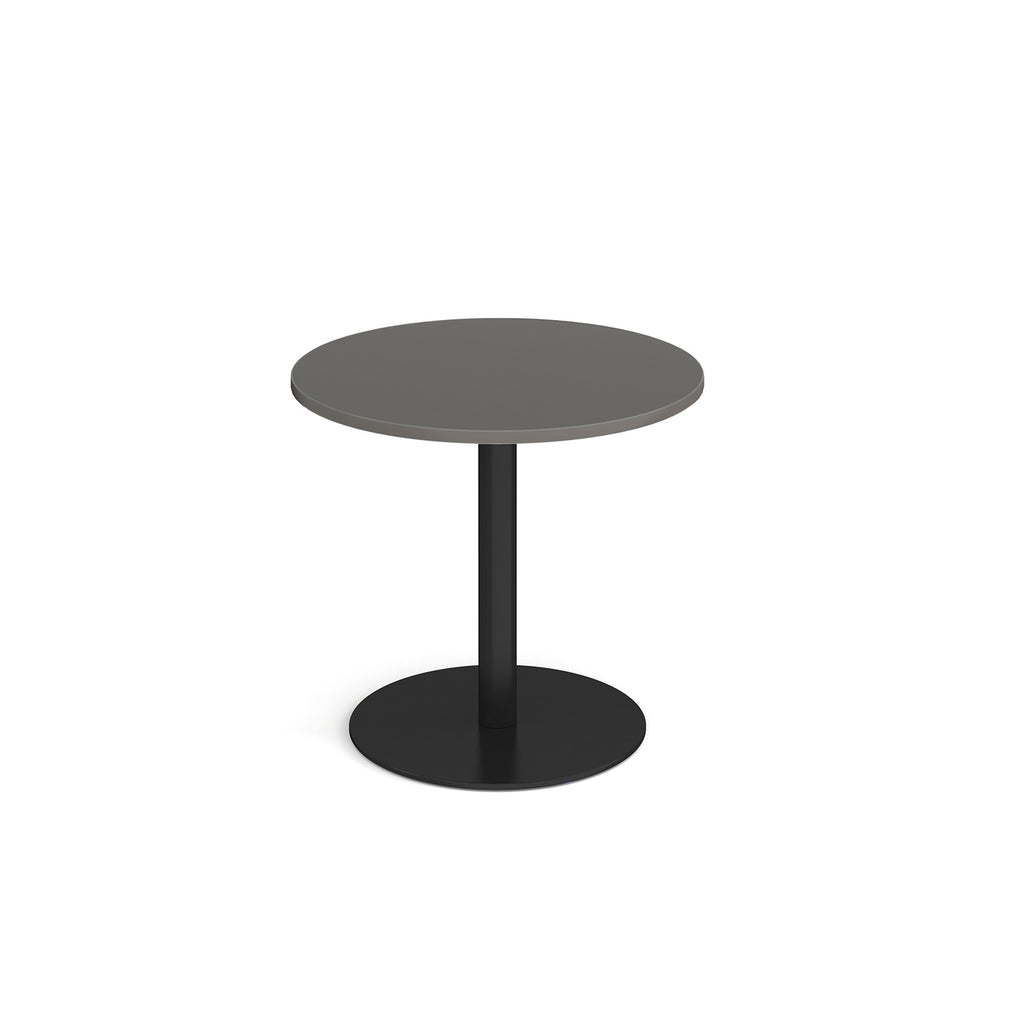 Round table with grey top and black base on a white background