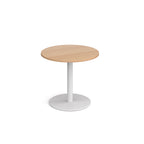 Round table with wood-effect top and white base on a white background