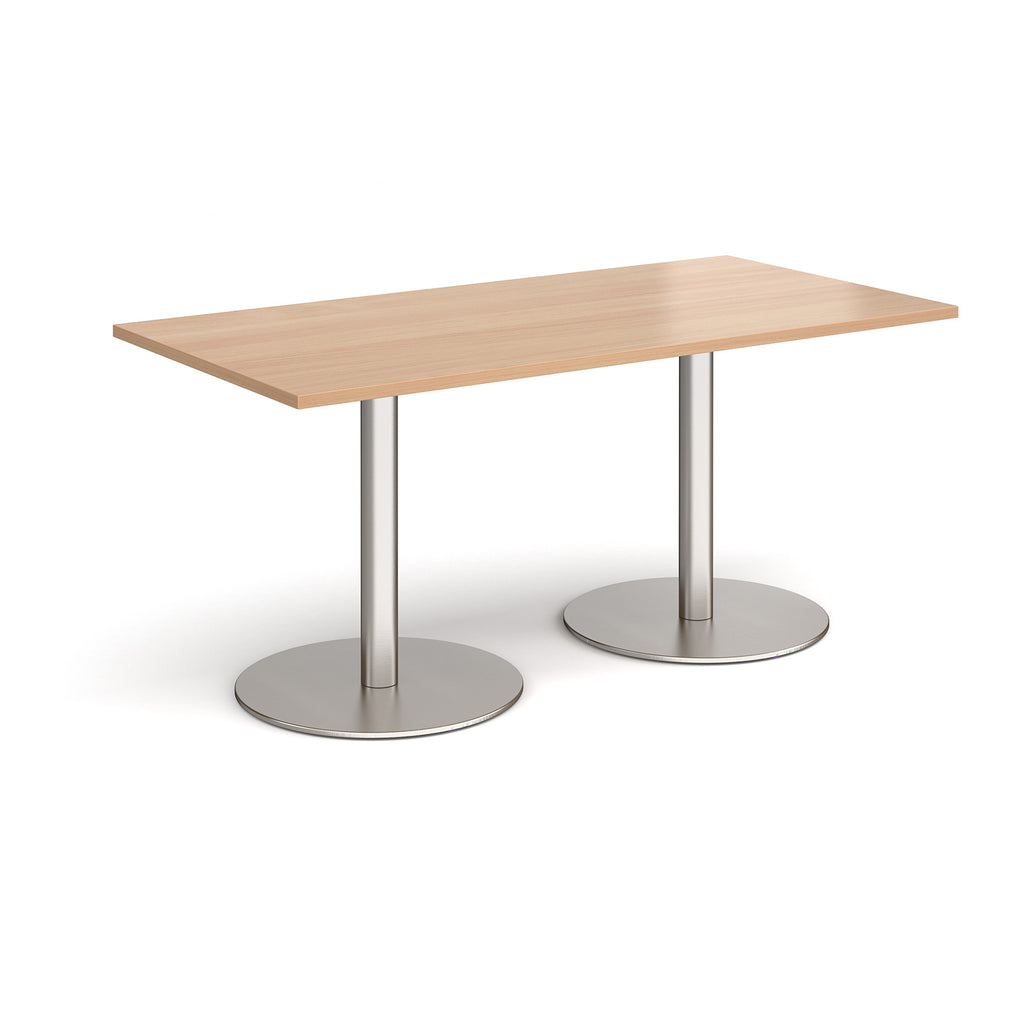 Rectangular table with wood-effect top and metal legs on a white background