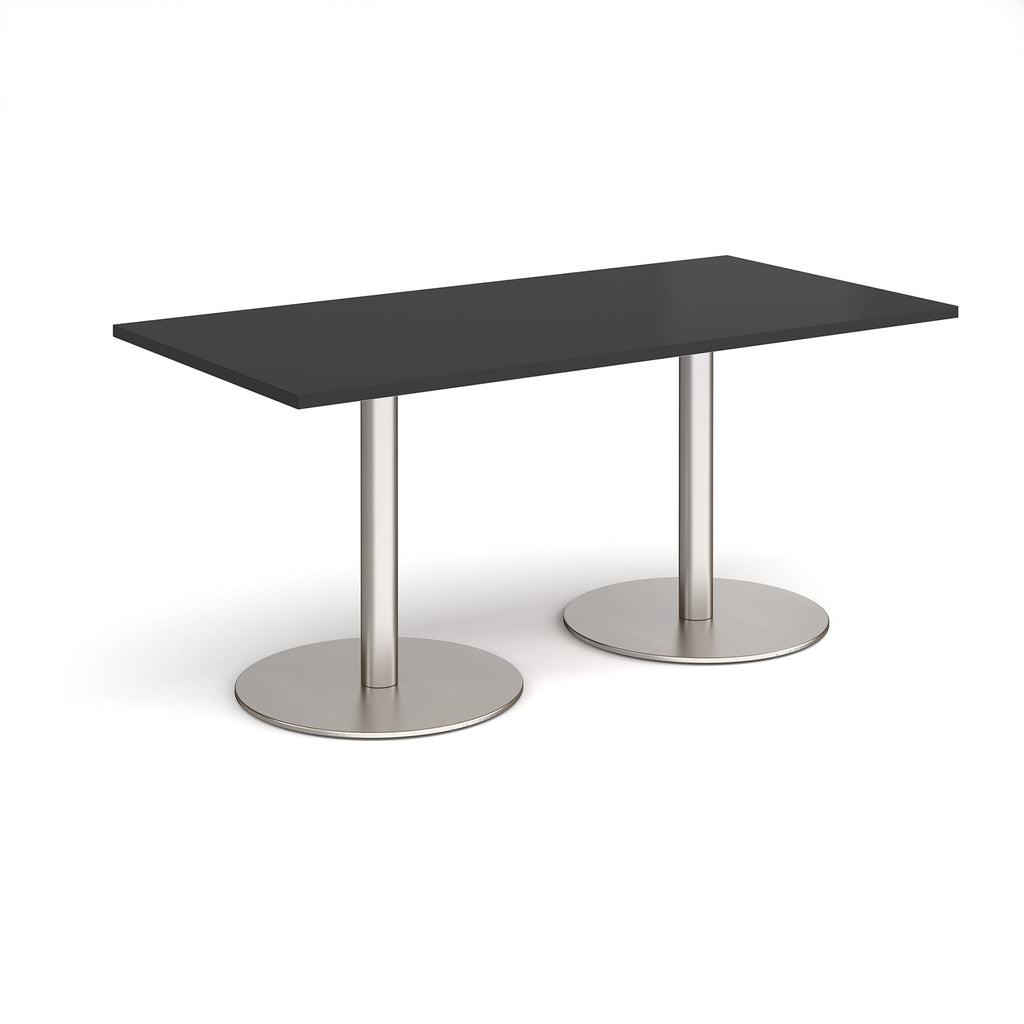 Black rectangular table with silver metal legs on a white background