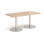 Rectangular table with wood-effect top and metal legs on a white background