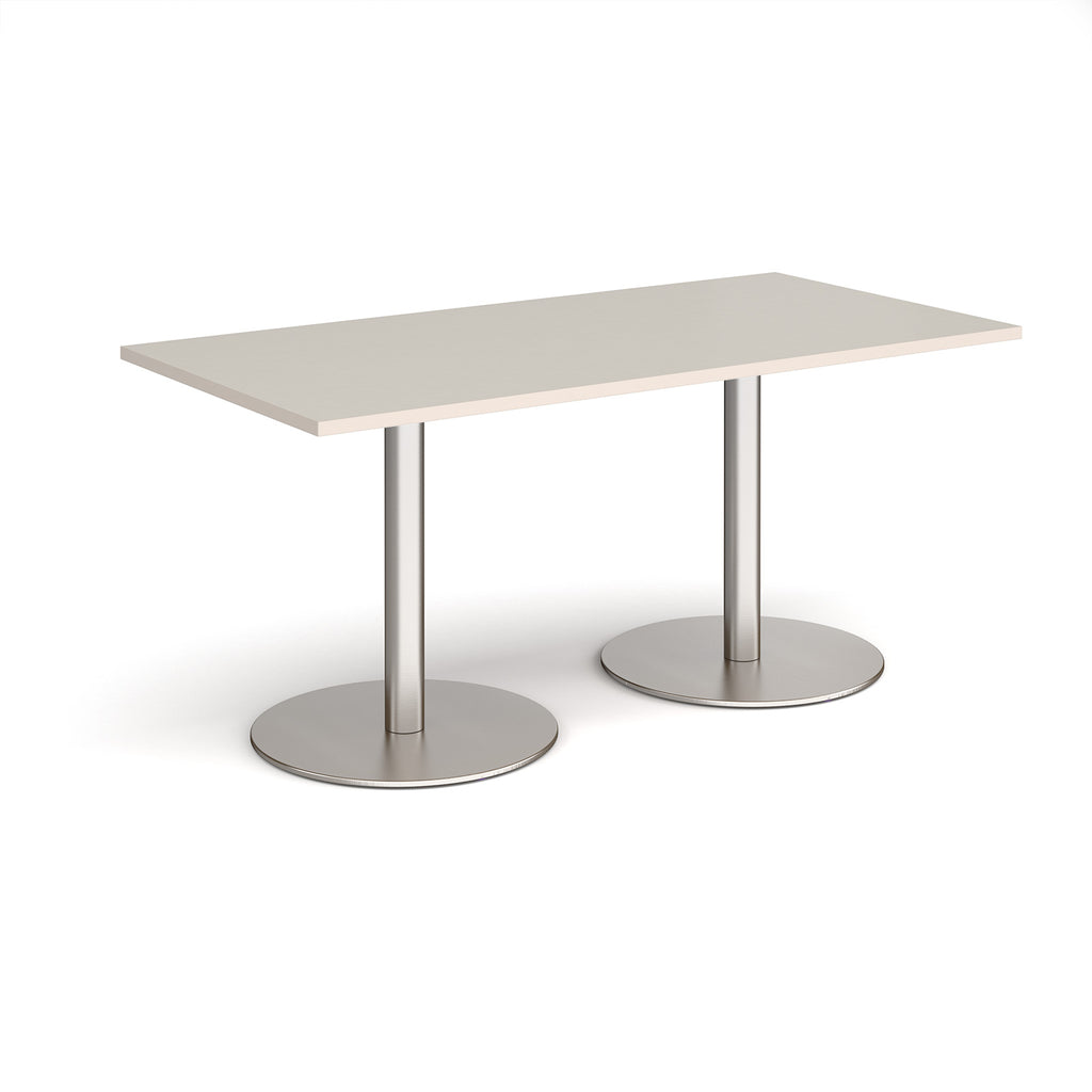 Rectangular table with light grey top and metal legs on a white background