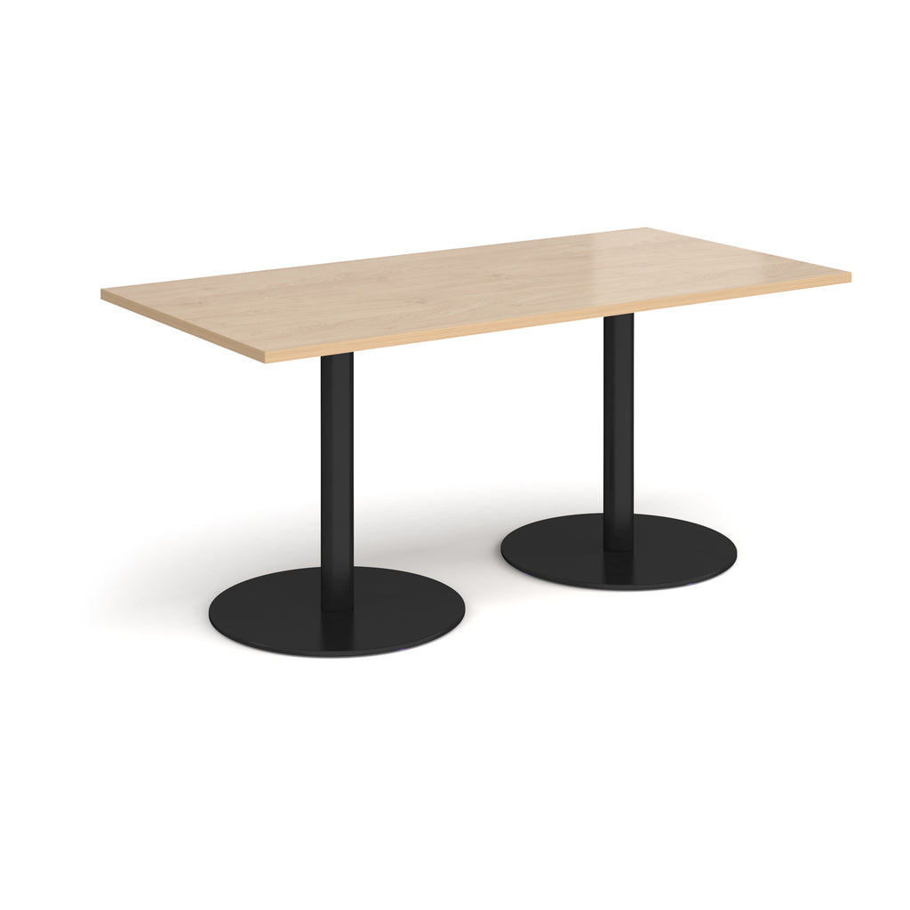 Rectangular table with wood-effect top and black legs on a white background