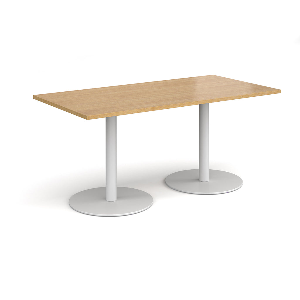 Rectangular table with wood-effect top and white legs on a white background