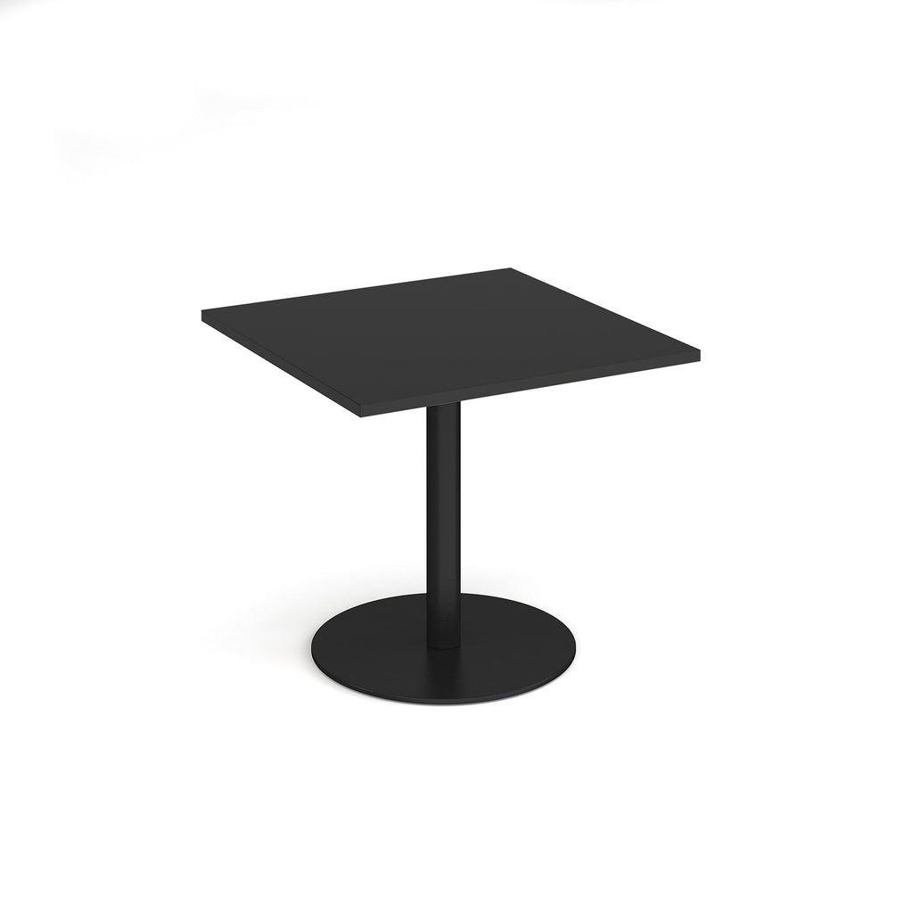 Black square table with round base on a white background