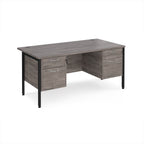 Wood-effect office desk with matching drawers and black metal frame on a white background