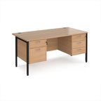 Wood-effect office desk with matching drawers and black metal frame on a white background