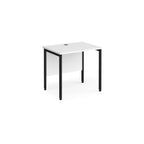 Office desk with white top and black metal frame on a white background