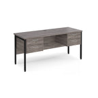 Wood-effect office desk with matching drawers and black metal legs on a white background