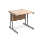 Office desk with wood-effect top and silver metal legs on a white background