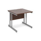 Office desk with wood-effect top and silver metal legs on a white background