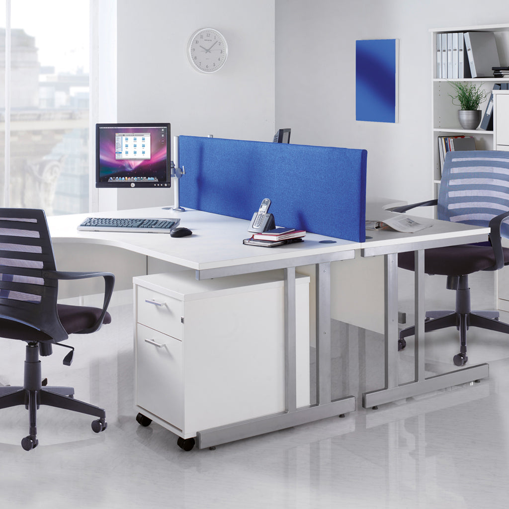 Modern office setup with a desk, chairs, and a blue partition.