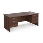 Wooden office desk with multiple drawers on a white background