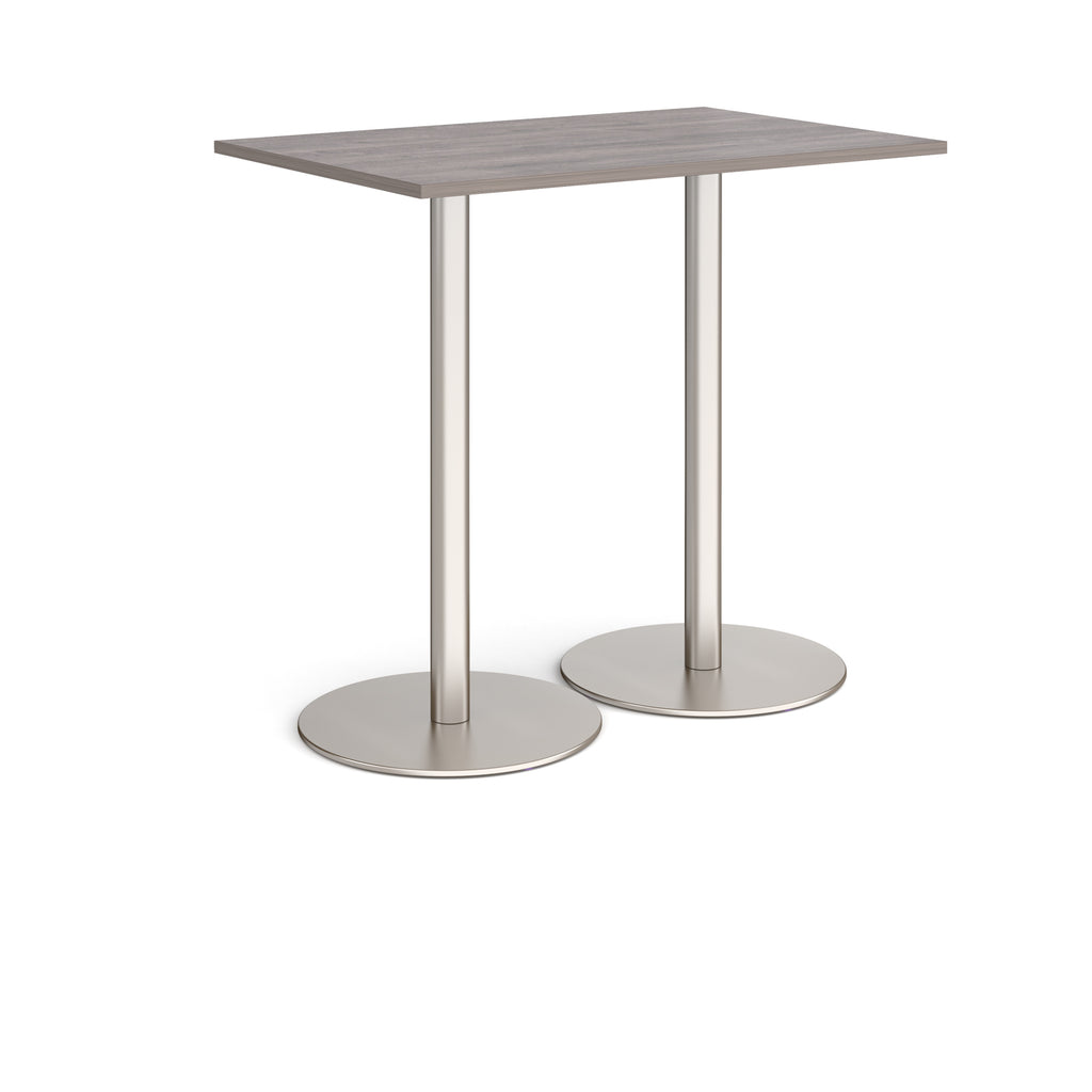 Rectangular table with a grey wood-effect top and metal base on a white background
