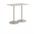 Rectangular table with light grey top and metal base on a white background