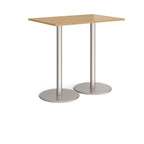 Rectangular table with wood-effect top and metal base on a white background