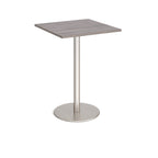 Square table with a grey wood-effect top and metal base on a white background