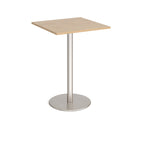 Square table with wood-effect top and metal base on a white background