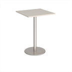 Square table with a light grey top and silver base on a white background