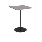 Square table with a grey wood-effect top and black base on a white background
