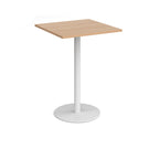 Square table with a wood-effect top and white cylindrical base on a white background