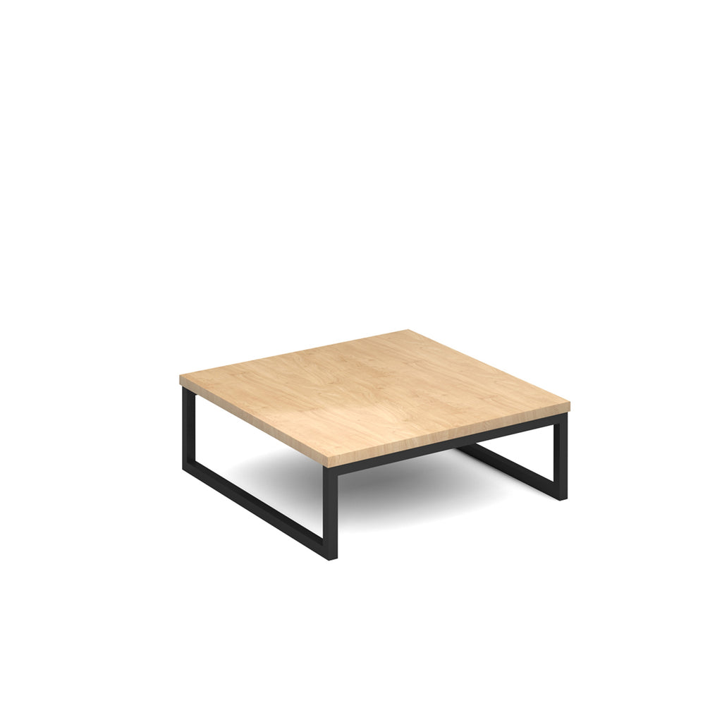 Modern coffee table with wood-effect top and black metal frame on a white background