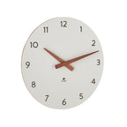 White wall clock with wooden hands on a white background