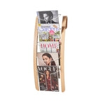 Magazine rack with various magazines displayed on a white background