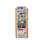 Wood-effect magazine rack with various magazines on a white background