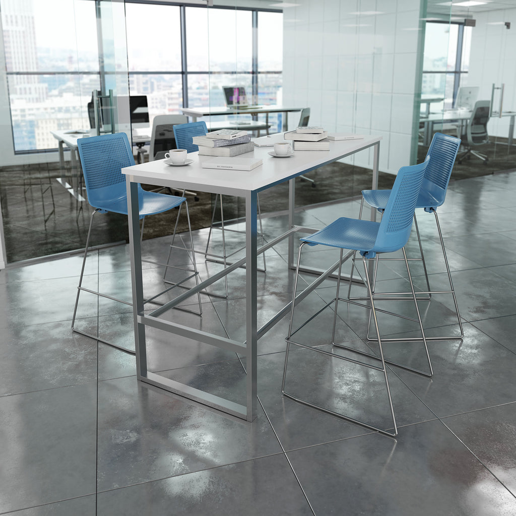 Modern office space with high tables and blue chairs