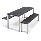Rectangular industrial-style bench table with a dark wood-effect top and matching bench seats on silver metal frames, shown on a white background.