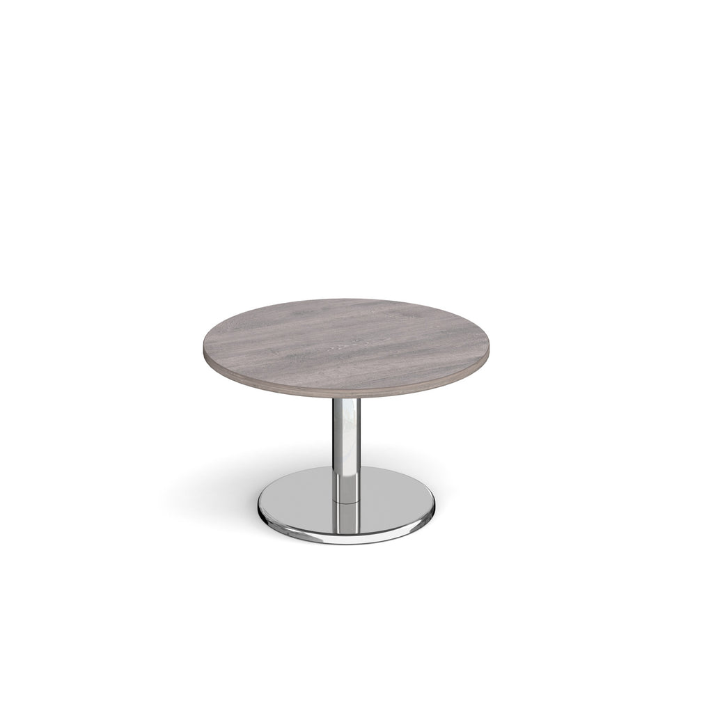 Round coffee table with grey wood-effect top and chrome base on a white background