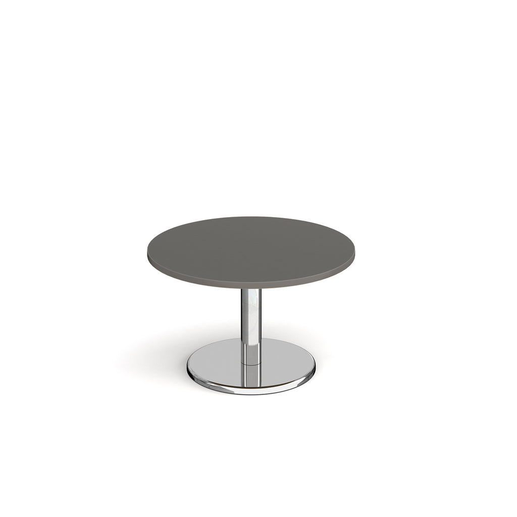 Round coffee table with grey top and chrome base on a white background