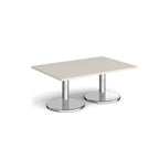 Rectangular coffee table with light grey top and chrome base on a white background