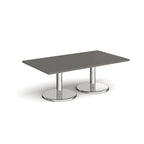 Rectangular coffee table with grey top and chrome base on a white background