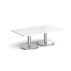 Rectangular coffee table with white top and chrome base on a white background