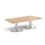 Rectangular coffee table with wood-effect top and chrome base on a white background
