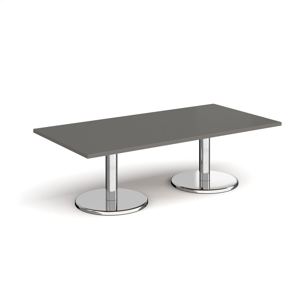 Rectangular coffee table with grey top and chrome base on a white background