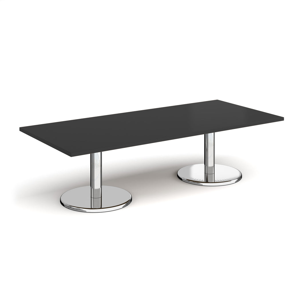 Rectangular coffee table with black top and chrome base on a white background