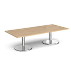 Rectangular coffee table with wood-effect top and chrome base on a white background
