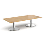 Rectangular coffee table with wood-effect top and chrome base on a white background