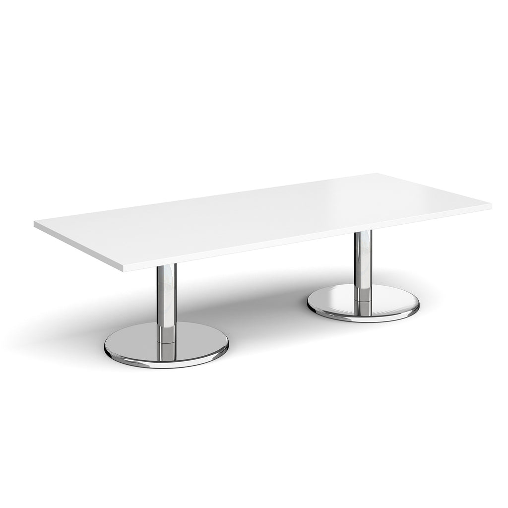 Rectangular coffee table with white top and chrome base on a white background