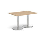 Rectangular table with wood-effect top and chrome legs on a white background